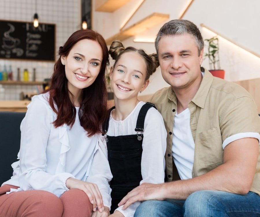 beautiful-smiling-family-embracing-in-cafe-2021-09-01-11-59-50-utc(1)